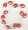 1 12x10mm Cherry Quartz Faceted Oval
